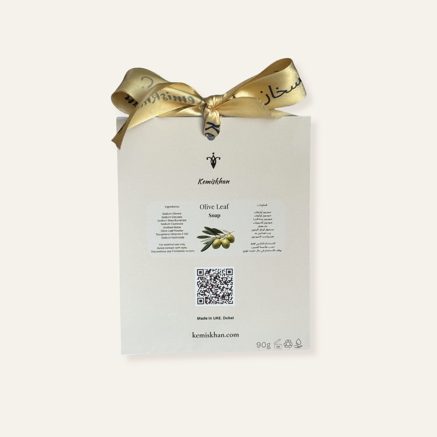Kemishkan olive leaf soap packaging with a gold ribbon on a white background